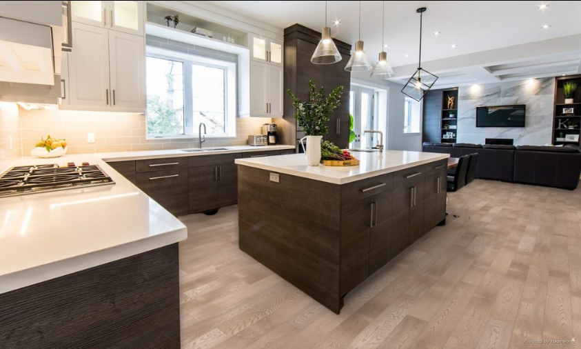 Morchello engineered oak hardwood flooring installed in a modern room, featuring wide 5" x 3/4" planks, 3mm - 4mm veneer layer, and natural wire-brushed finish. 