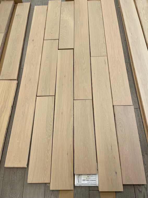Planks of Naked Oak VIDAR premium American Oak engineered hardwood flooring.