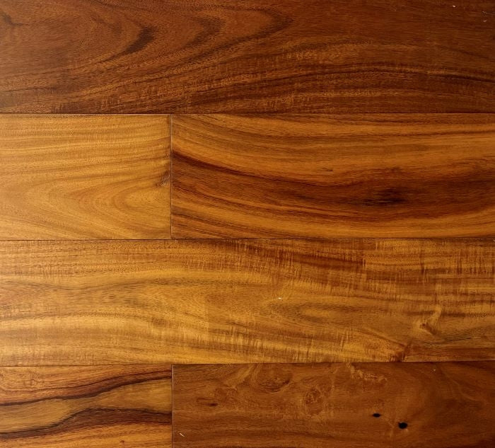 Close-up showing the texture and color of Tan NAF exotic walnut solid hardwood flooring.