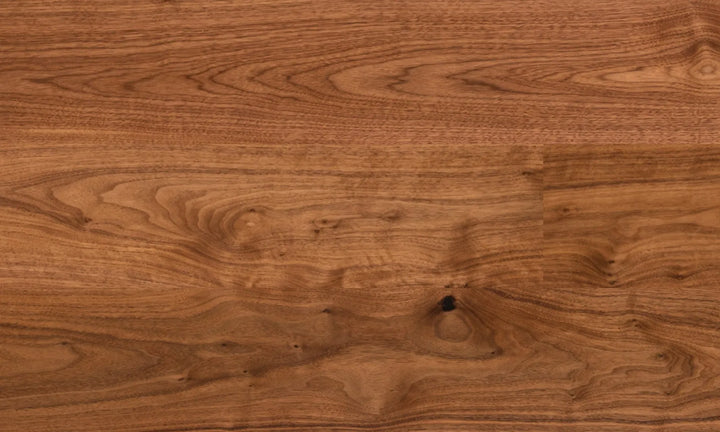 Close-up of Opera engineered walnut hardwood flooring by Fuzion, featuring a wire-brushed texture, 7 1/2" x 9/16" plank. available at Advanced Flooring Waterloo.