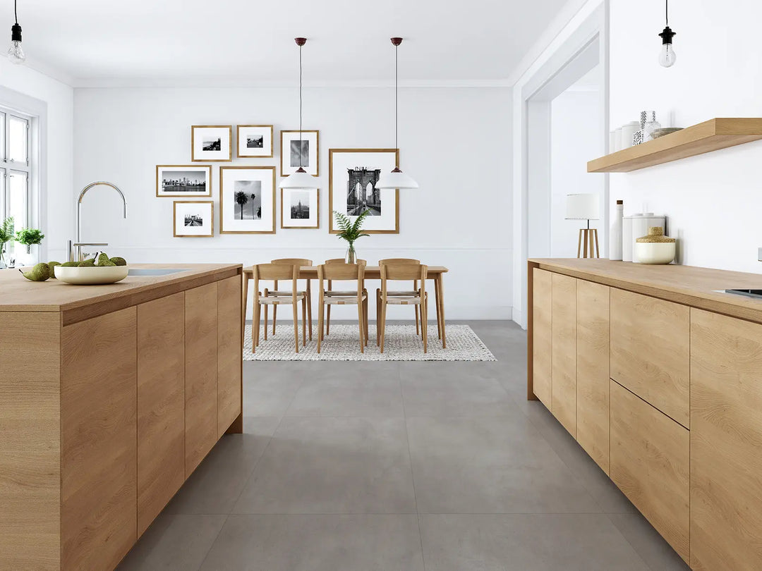 Modern kitchen with wooden cabinets and a dining area.