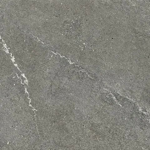 Close-up of a textured gray surface with a diagonal crack.