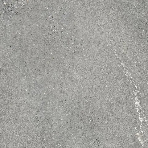 Close-up of a textured gray surface with a white border