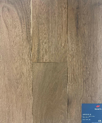 A close up of Rowling Novella premium 6-½” engineered hardwood flooring from Canadian Standard.