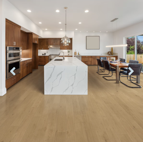 A modern kitchen and dining room which displays the beautiful look of Sable premium engineered hardwood flooring from Toucan.