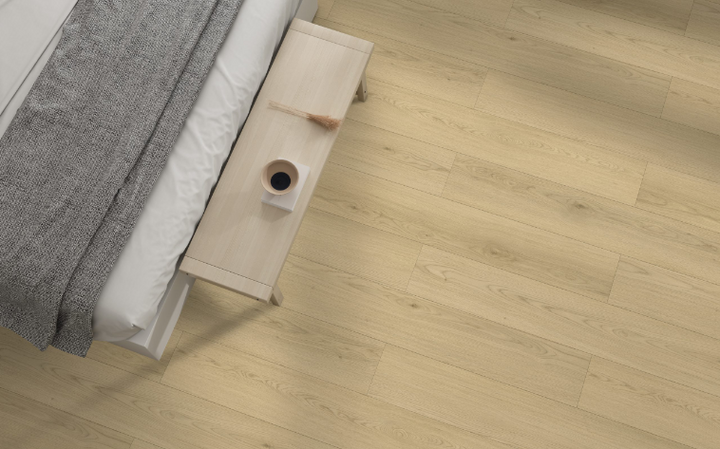 Santa Fe Fuzion FuzGuard waterproof laminate flooring installed in modern living space, durable AC4 12mm planks. Available at Advanced Flooring Waterloo.