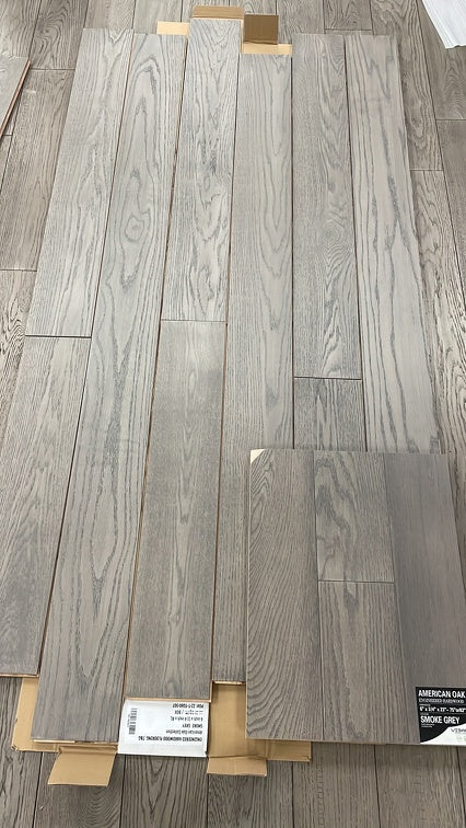 Planks of Smoke Grey VIDAR premium American Oak engineered hardwood flooring.