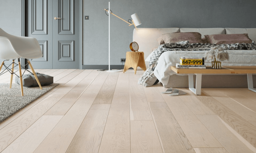 Snow Peak engineered European oak hardwood flooring from Outer Banks Clic collection installed in a modern room, featuring wide 6" x 9/16" planks, 2.5mm veneer layer. Canada-wide delivery available. 