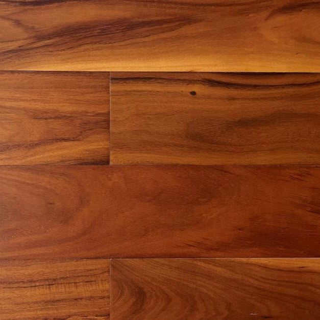 Close-up showing the texture and color of Tan NAF exotic walnut solid hardwood flooring.