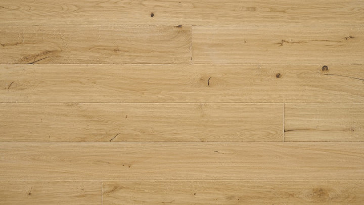 Terracotta 7-1/2 inch wide white oak engineered hardwood flooring in natural brown color with distressed hand-scraped texture