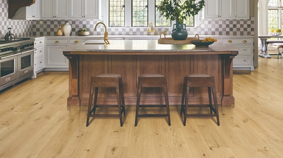 Modern interior featuring Terracotta white oak engineered hardwood flooring with wide 7-1/2 inch planks in natural brown finish from the Atelier Collection