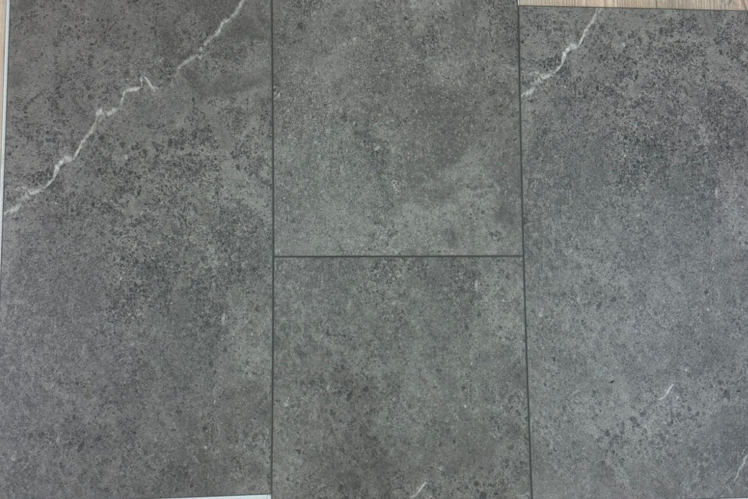 Gray tiles on a wooden floor