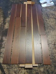 A close up of Chocolate VIDAR premium 5” engineered hardwood flooring in herringbone planks.