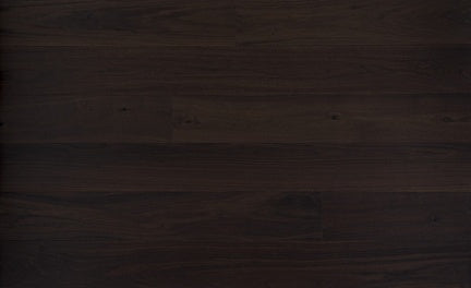 A close up of Chocolate VIDAR premium 5” engineered hardwood flooring in herringbone.