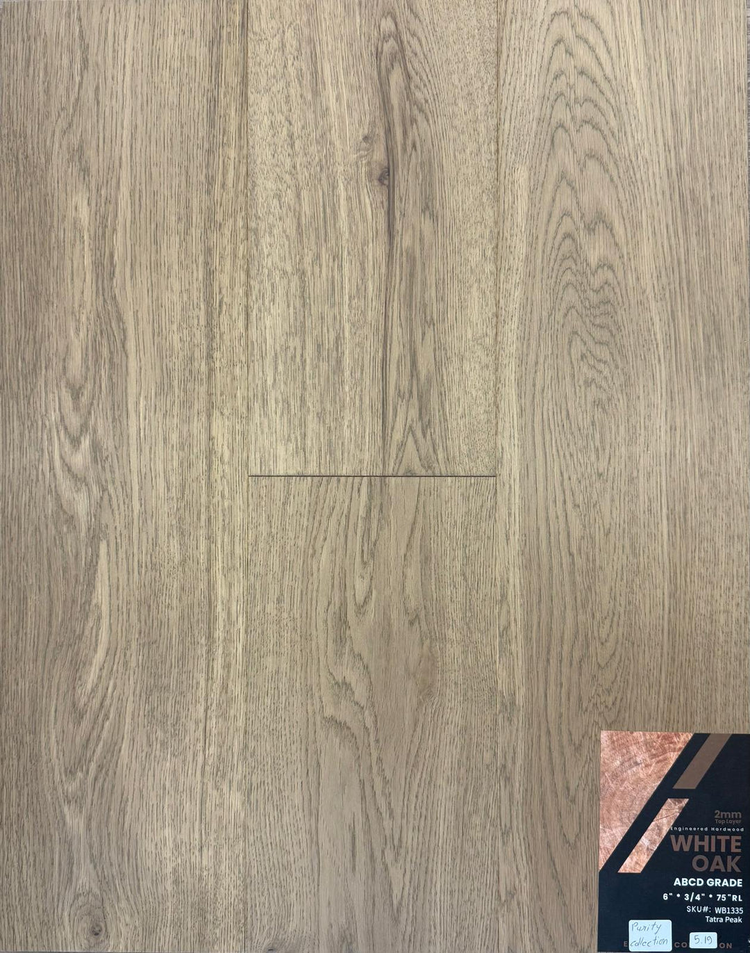 Close-up of TATRA PEAK WB1335 - Purity Collection by Green Touch, 2mm top layer engineered hardwood flooring sample. Available at Advanced Flooring Waterloo. 