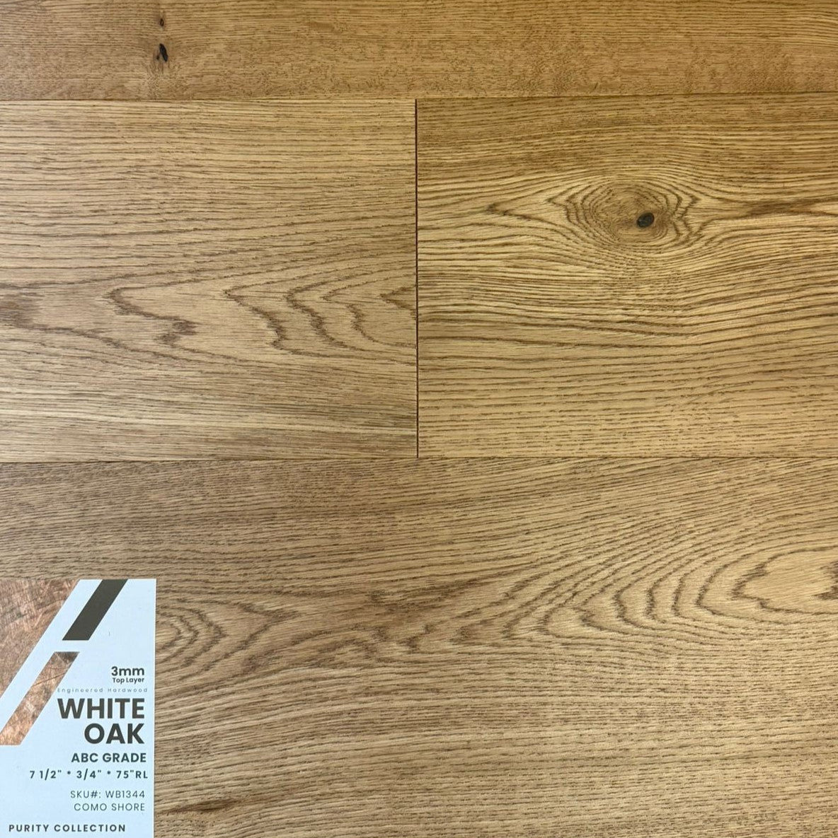 Close-up of COMO SHORE WB1344 - Purity Collection by Green Touch, 3mm top layer engineered hardwood flooring sample. Available at Advanced Flooring Waterloo. 