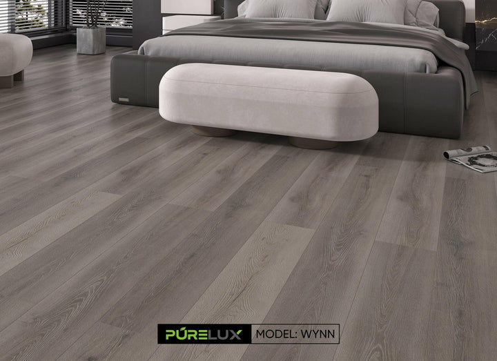 Bedroom interior with Purelux Wynn Journey Series SPC vinyl plank – 9mm waterproof luxury vinyl flooring by Advanced Flooring