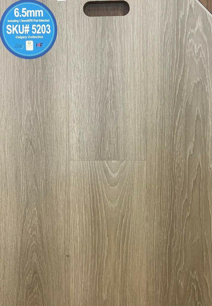 Close-up showing the texture and color of 5203 Riche 6.5mm vinyl flooring.