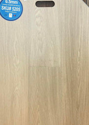 Close-up showing the texture and color of 5205 Riche 6.5mm vinyl flooring.