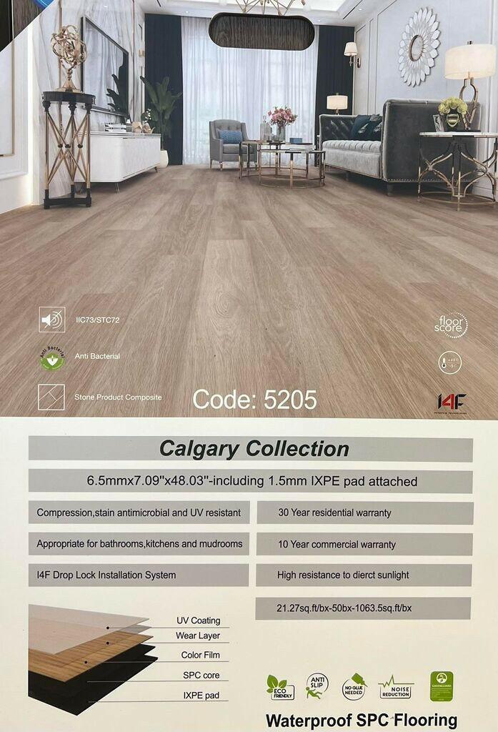 A modern bedroom which displays the beautiful look of Riche vinyl flooring.