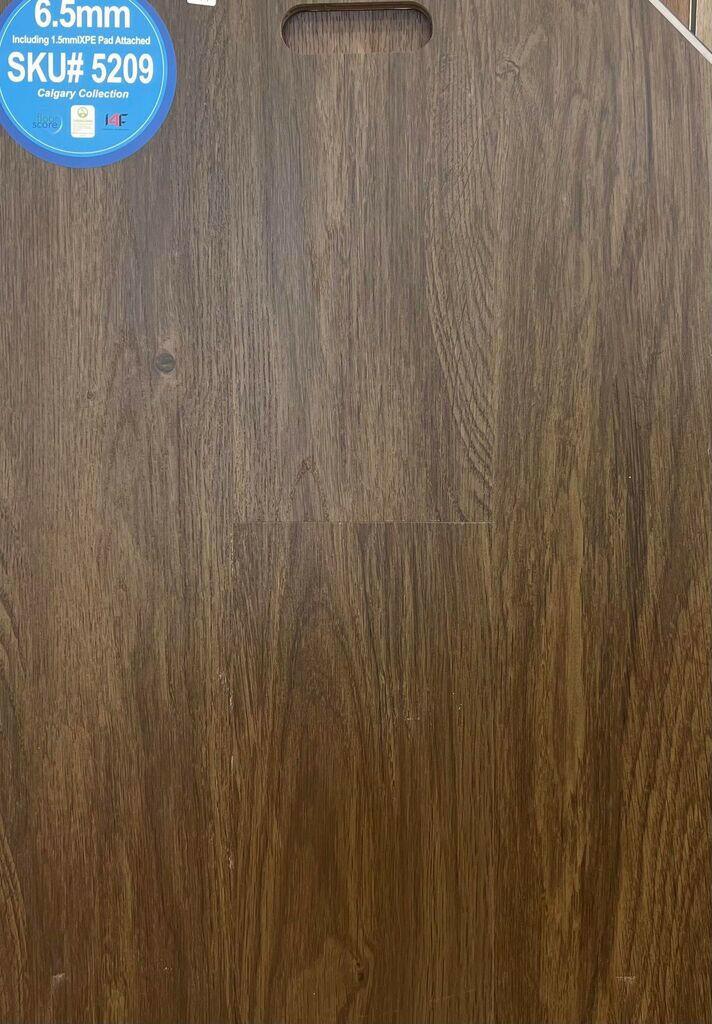 Close-up showing the texture and color of 5209 Riche 6.5mm vinyl flooring.