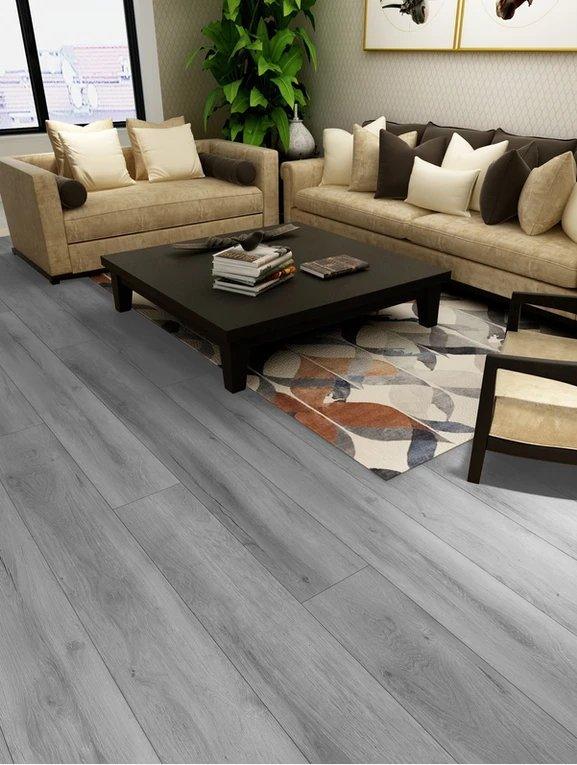 Beautiful room with 8mm vinyl flooring installed in the colour 803 Ashy Stone by Woden Flooring sold by Advanced Flooring in Kitchener-Waterloo.
