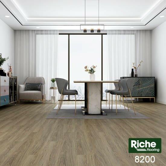 A modern bedroom which displays the beautiful look of Riche vinyl flooring.