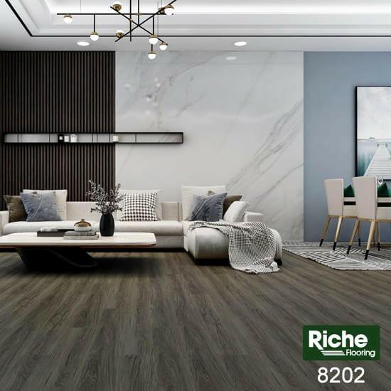 A modern bedroom which displays the beautiful look of Riche vinyl flooring.