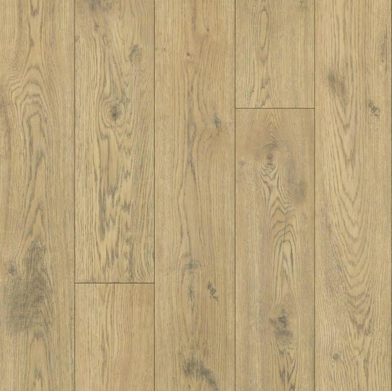 Close up of Waterproof Laminate in the colour Almondine Oak by Mohawk RevWood sold by Advanced Flooring in Kitchener-Waterloo.