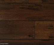Close-up showing the texture and color of Antique Maple NAF 12mm handscraped laminate flooring.