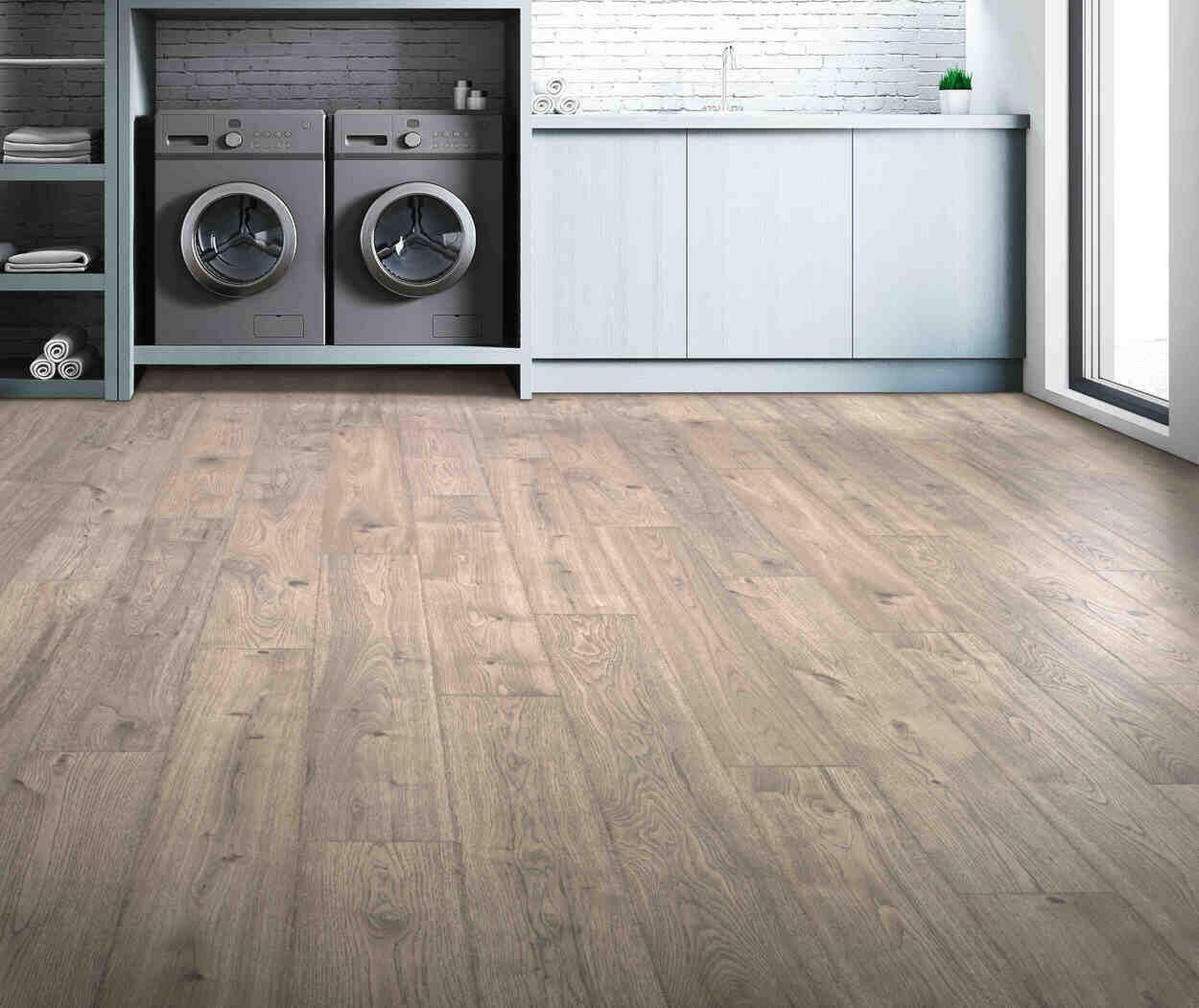 modern laundry room with Asher Grey Oak Mohawk RevWood Plus Elderwood installed