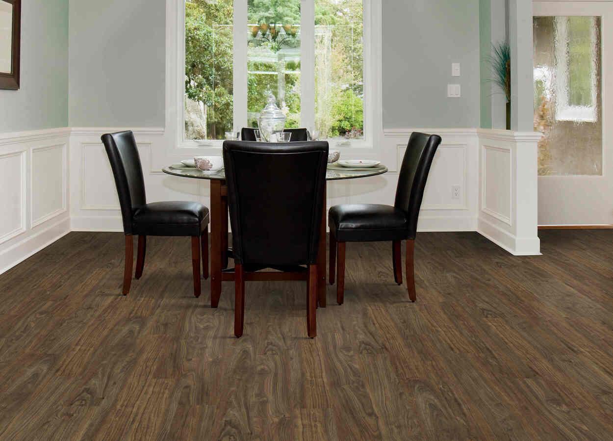 Modern room with 4.5mm vinyl plank installed in the colour Bonbon by Mohawk SolidTech sold by Advanced Flooring in Kitchener-Waterloo.