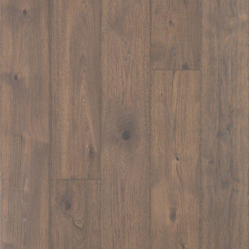 close up of Bungalow Oak Mohawk RevWood Plus Elderwood waterproof laminate sold by Advanced Flooring
