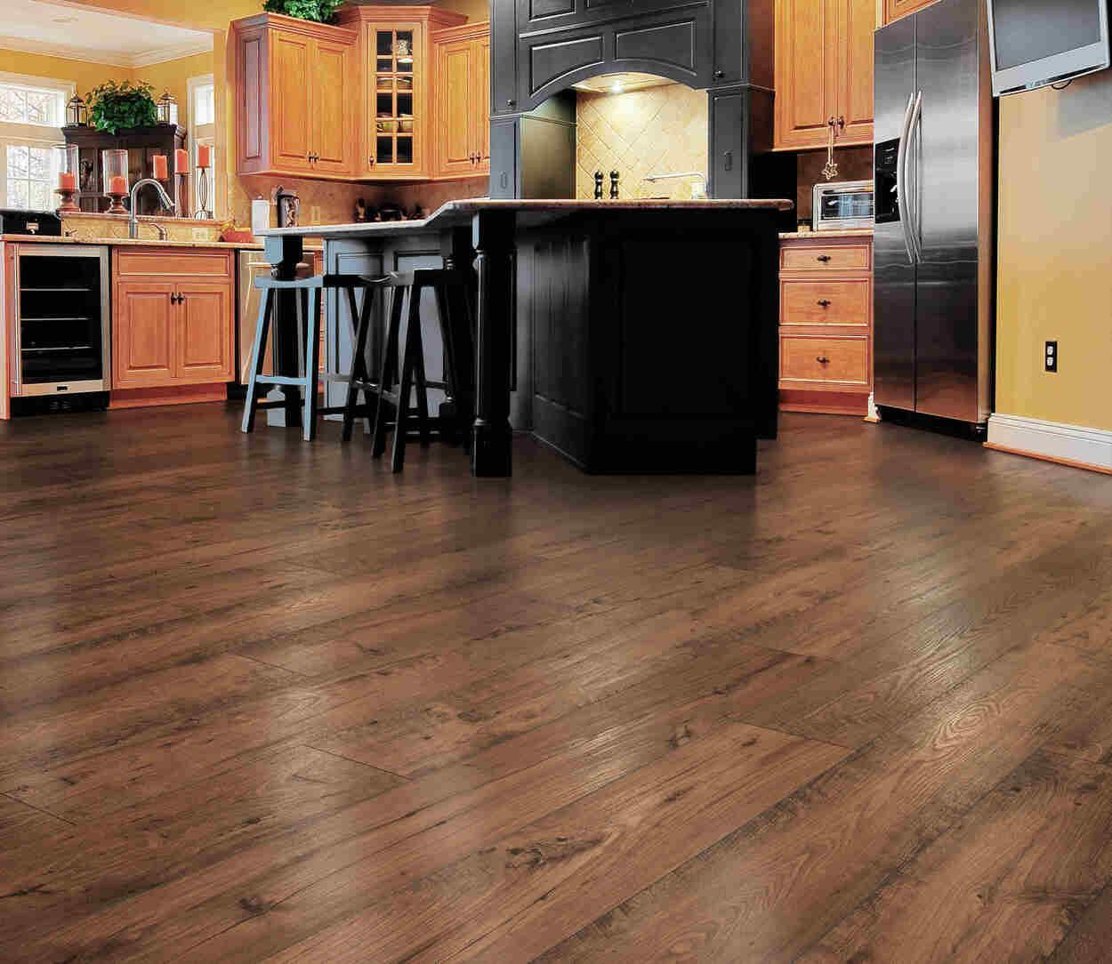 Rustic kitchen with Cedar Chestnut waterproof laminate flooring by Mohawk RevWood Select RARE VINTAGE installed.
