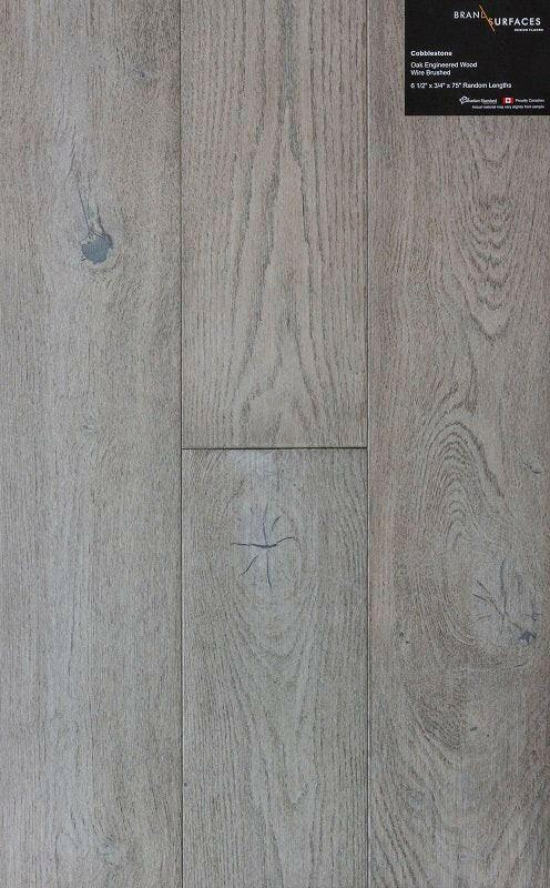 A close up of Cobblestone BRAND SURFACES premium 6-½” engineered hardwood flooring from Canadian Standard.