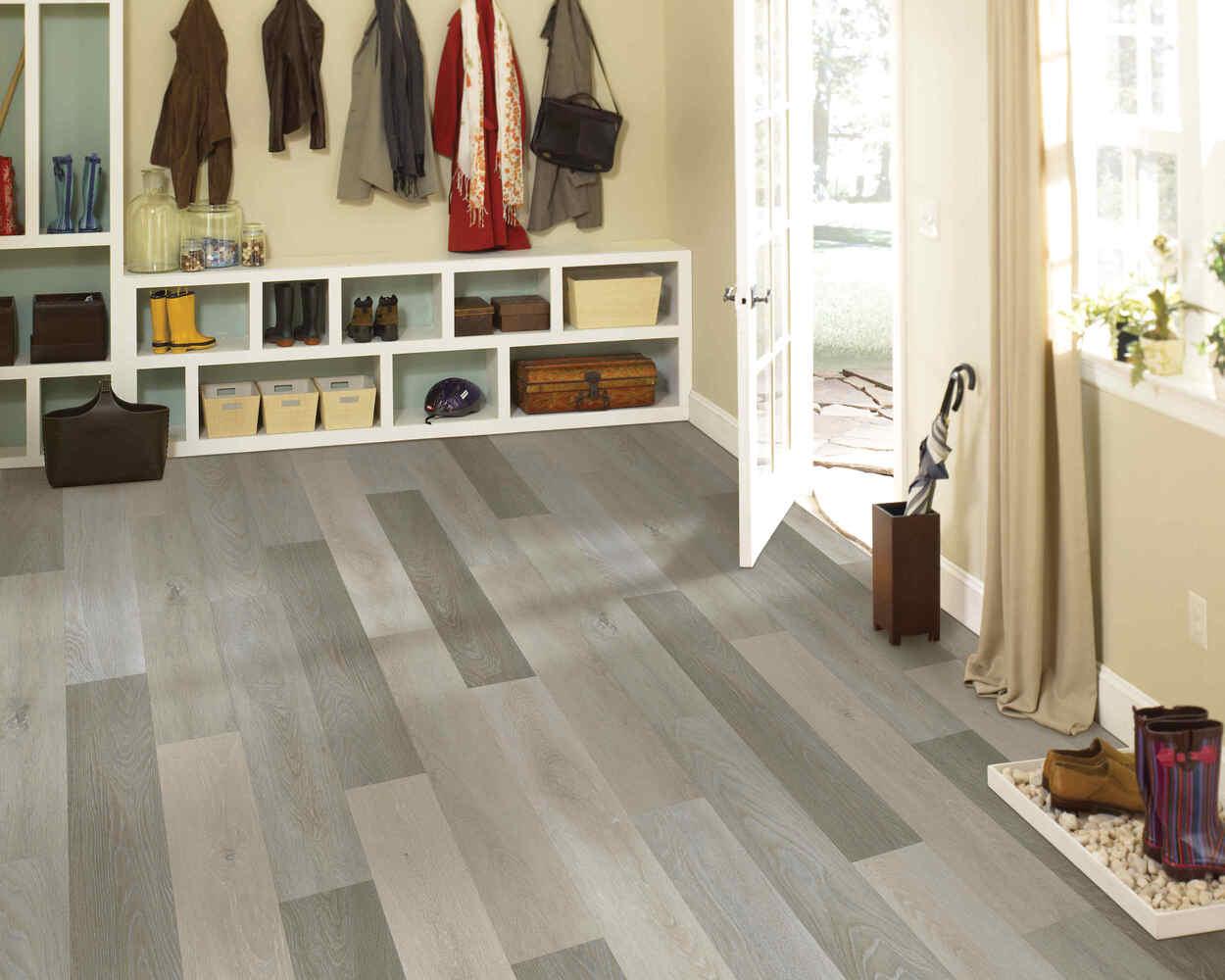 Modern room with Dazy Hazy from Mohawk SolidTech Explorer's Cove luxury vinyl plank 5mm  installed.