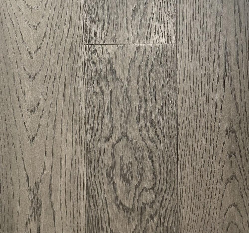 A close-up of English Grey European Oak 6.5" Engineered Hardwood from Riche.