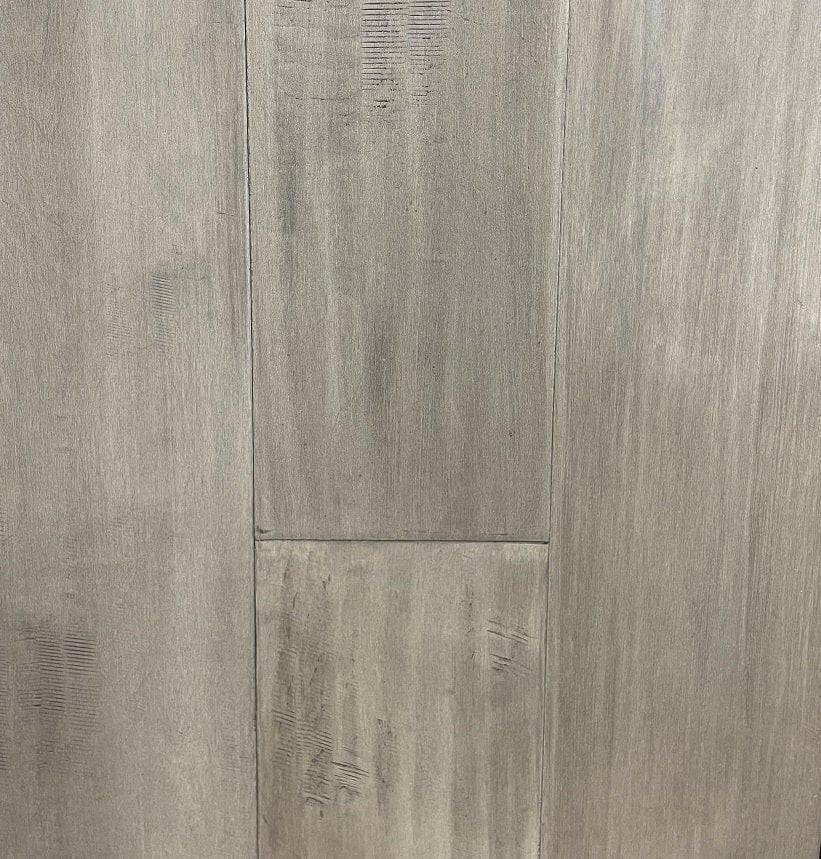 Close-up of GLACIER GRAY MP1314 - Green Touch 7-1/4" x 3/4" Maple engineered hardwood flooring sample. Available at Advanced Flooring Waterloo. 