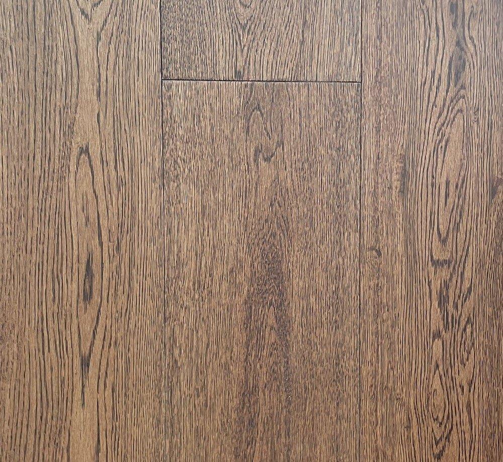 A close-up of Harvest European Oak 6.5" Engineered Hardwood from Riche.