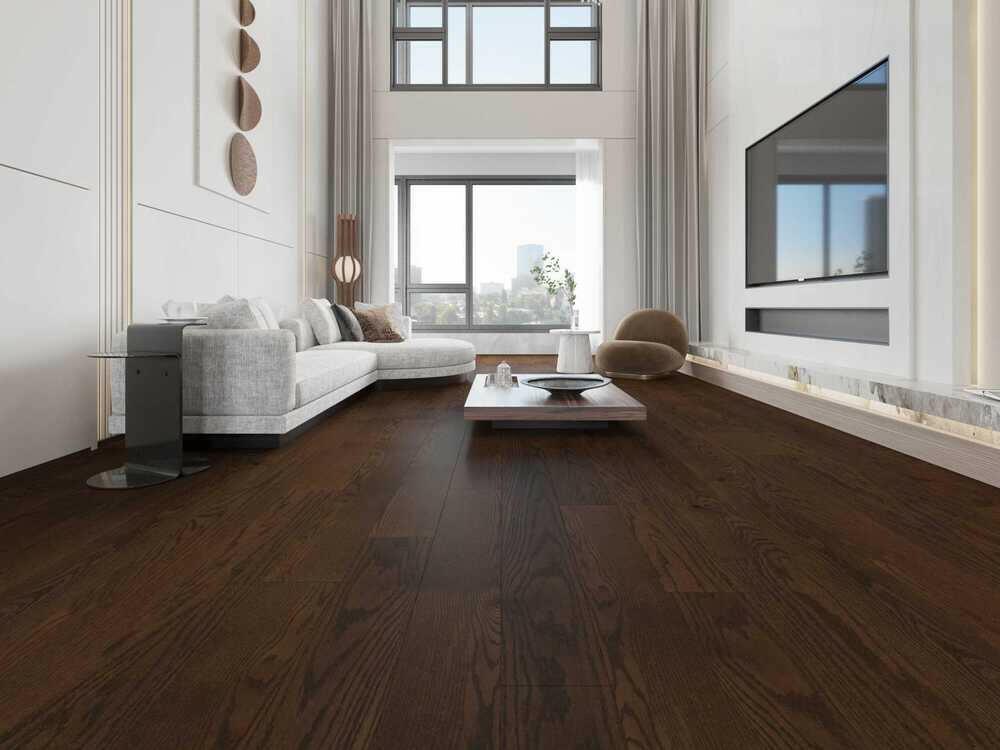 A modern living room which displays the beautiful look of Hazelnut premium engineered hardwood flooring from Vidar.