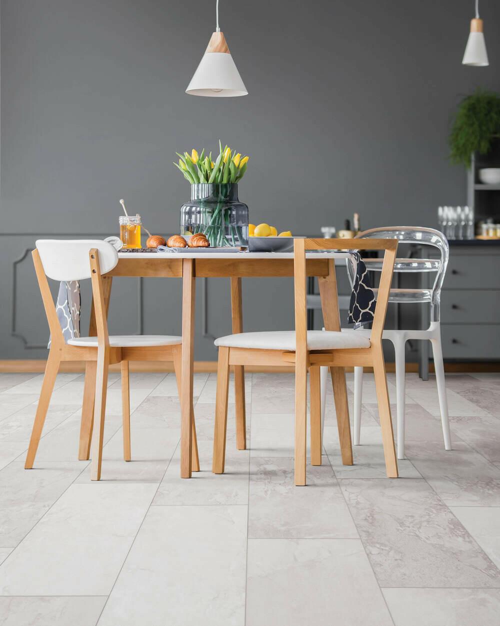 Modern room with 6mm vinyl tile installed in the colour Ice Fog by Mohawk SolidTech sold by Advanced Flooring in Kitchener-Waterloo.