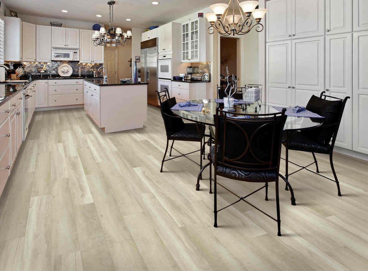 Modern kitchen with 6mm vinyl plank installed in the colour Iced Chardonnay by Mohawk SolidTech sold by Advanced Flooring in Kitchener-Waterloo.