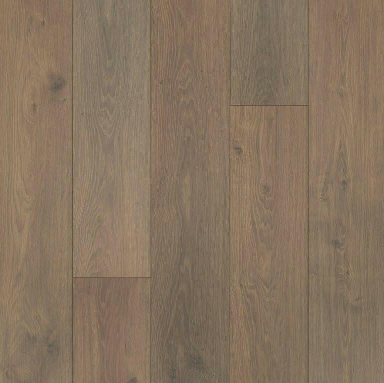 Close up of Waterproof Laminate in the colour Light Truffle Oak by Mohawk RevWood sold by Advanced Flooring in Kitchener-Waterloo.