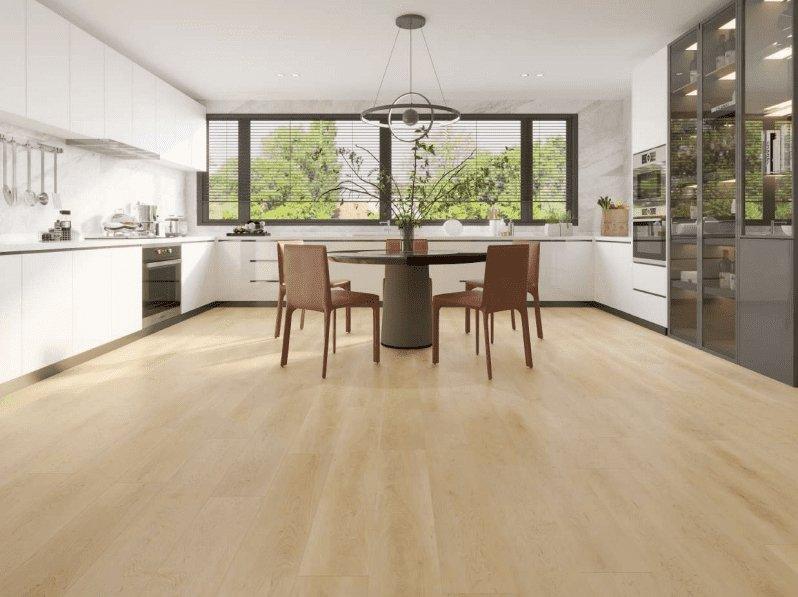 A bright and inviting kitchen showcasing the rich, tan tones of Purelux vinyl plank flooring.
