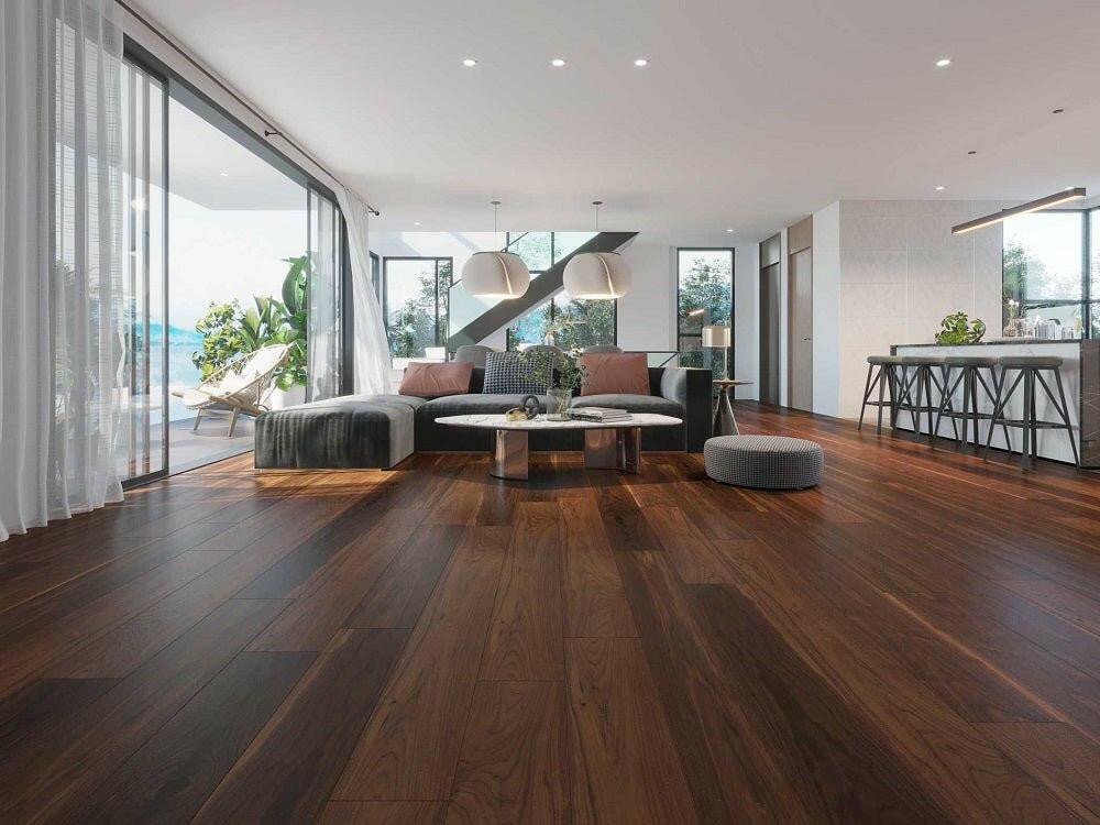 A modern living room which displays the beautiful look of Natural premium American Black Walnut engineered hardwood flooring from Vidar.