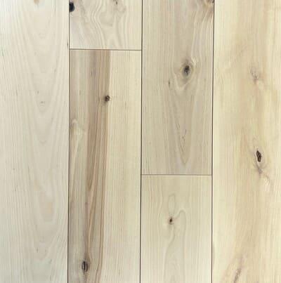 A close up of Pale Oats BRAND SURFACES premium solid hardwood flooring from Canadian Standard.