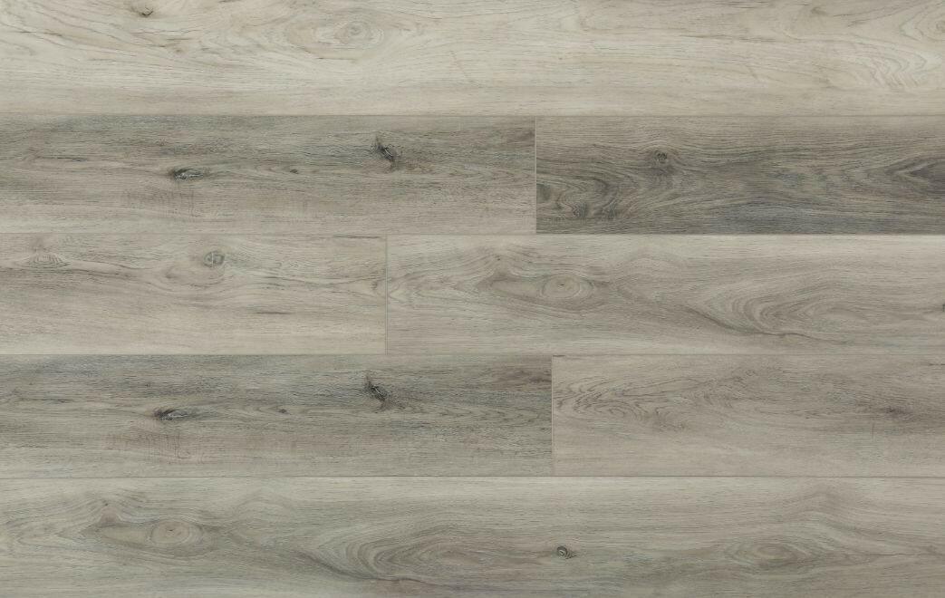 Close-up showing the texture and color of Pelissier Purelux vinyl plank flooring.