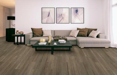 Modern room with 4.5mm vinyl plank installed in the colour Rustic Taupe by Mohawk SolidTech sold by Advanced Flooring in Kitchener-Waterloo.