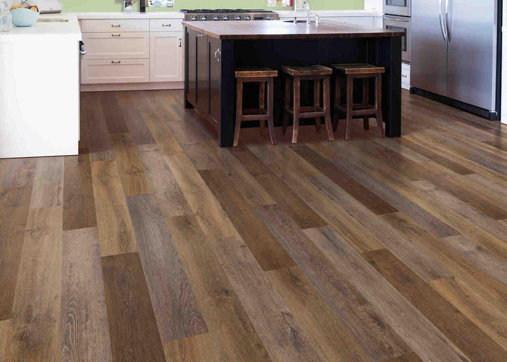 Modern kitchen with Shadow Woodlands from Mohawk SolidTech Explorer's Cove luxury vinyl plank 5mm installed.