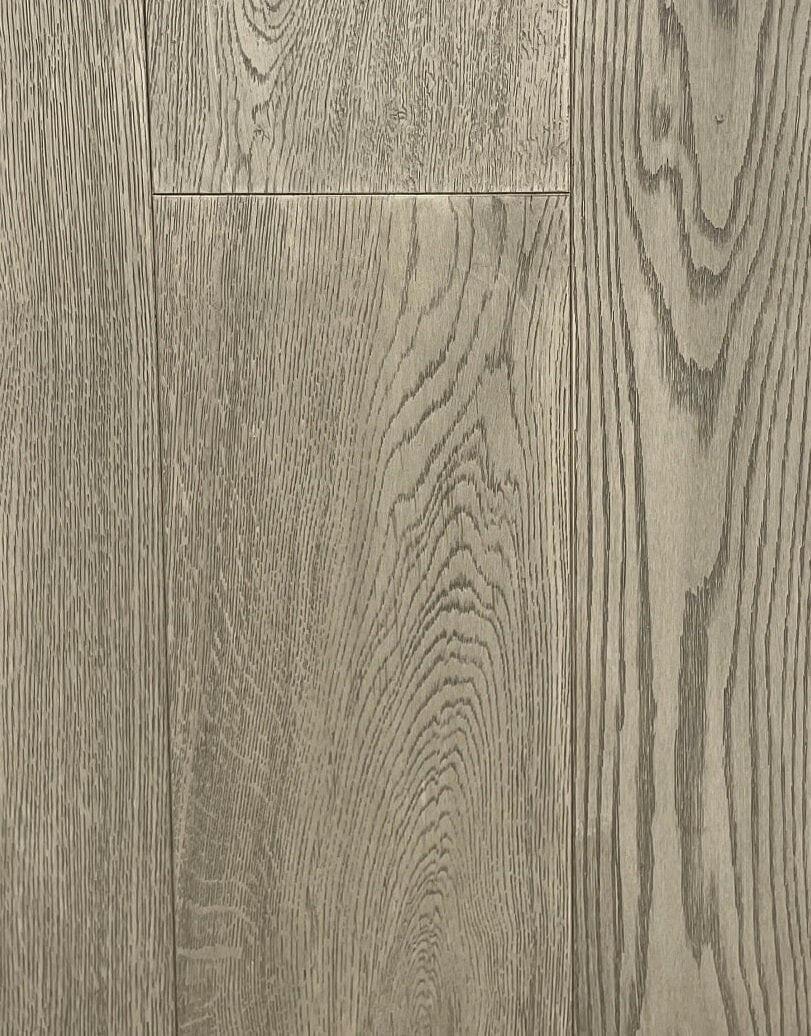 A close-up of Silver Grey European Oak 7.5" Engineered Hardwood from Riche.